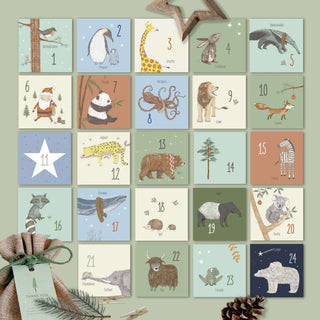 Adventskalender-Set mit 24 nummerierten Boxen, jede mit Tieren illustriert, zum DIY-Befüllen; dekorativ, naturverbundenes Design.