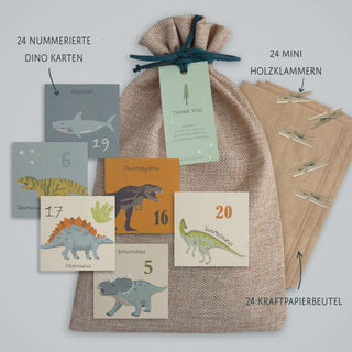 Adventskalender-Set mit Dinosaurier-Motiv, enthält 24 nummerierte Dino-Karten, Mini-Wäscheklammern, Kraftpapiertüten, Sackleinen.