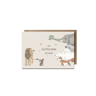 Geschenkegutschein mit Tierillustrationen: Löwe, Elefant, Fuchs, Hase und Chamäleon, Text "ein GUTSCHEIN für dich!" zentral.