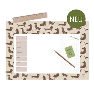 Wochenplaner mit Dackeldesign im skandinavischen Stil, mit Abschnitten für Aufgaben, Lineal, Bleistift und Notizblock.