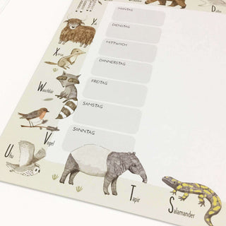 Papierblock Unterlage/Wochenplaner "Tier ABC" mit illustrierten Tieren wie Uhu, Tapir, Salamander und deutschen Wochentagen.