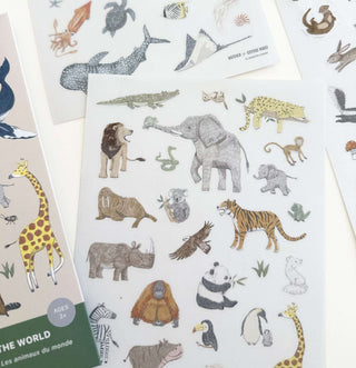 Transparente Sticker mit globalen Tierillustrationen: Elefanten, Löwen, Tiger, Giraffen, perfekt für kreative Projekte.